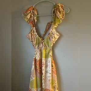 a very cute open back dress, with cut outs in the front! perfect for summer/vacy